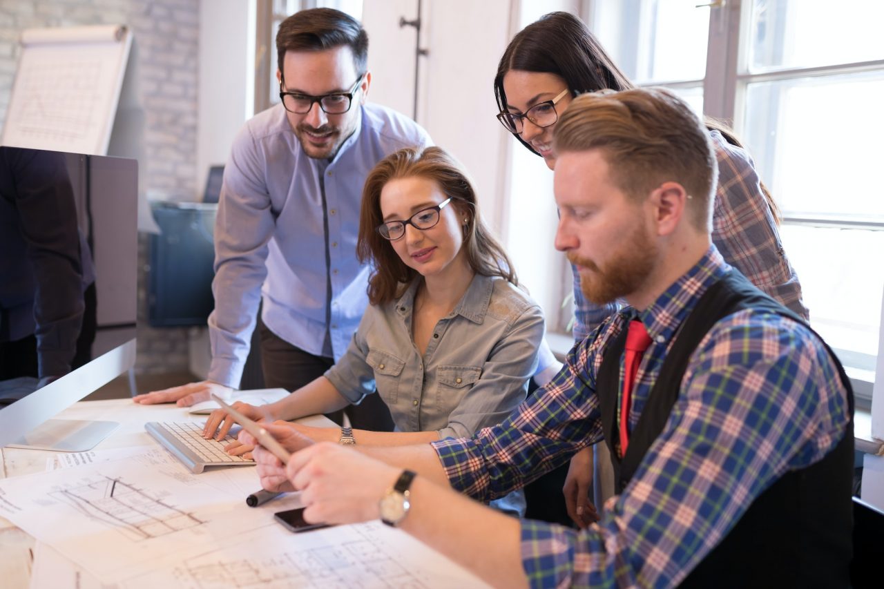 startup teamwork brainstorming meeting concept in office -